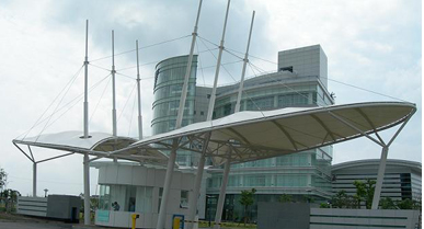 Canopy structure for building facade